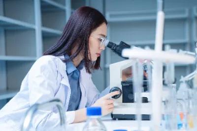 Asian woman working in lab