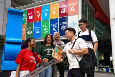 sdg logo and students