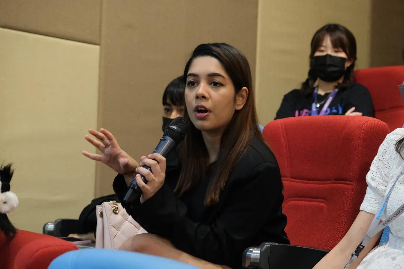 Audience members during the talk