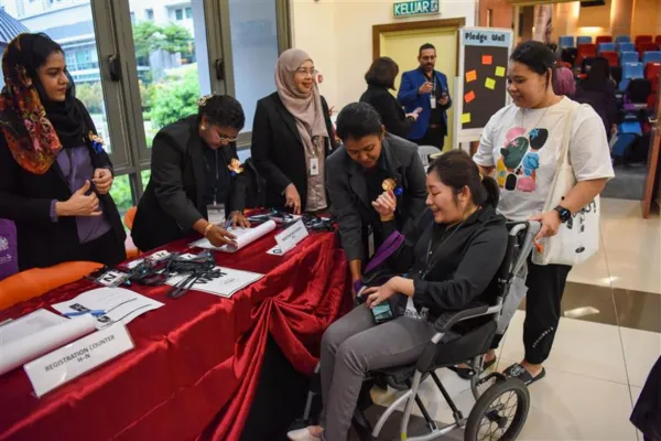 Registration Begins! Among the early arrivals was Ashley, one of our remarkable students who came to support the event.&nbsp;