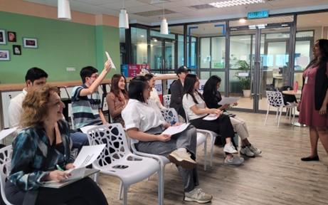 Anita Paul engaging and encouraging participants during activities.