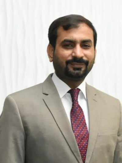 Dr Numan Arshid