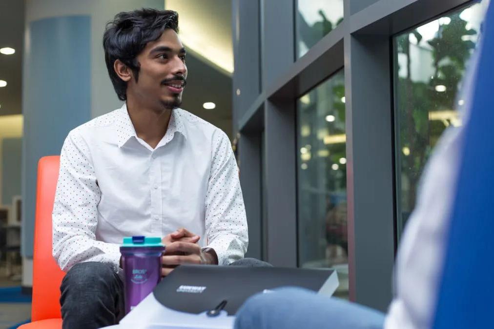 Student sitting down